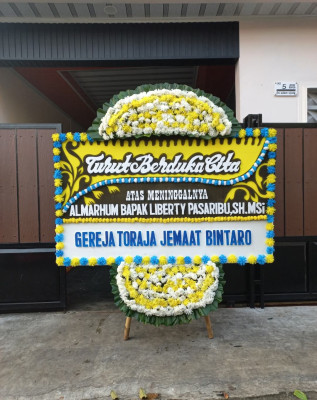 Papan Bunga Duka di Penebel